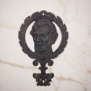 Vintage Black Cast Iron Trivet Hot Pot Abraham Lincoln President