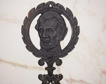 Salvamanteles de hierro fundido negro antiguo para olla caliente Abraham Lincoln Presidente