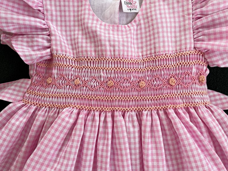 Petit Bebe Girls Pink Gingham Smocked Birthday Dress main image 0