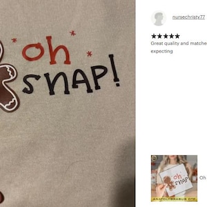 a person is holding a t - shirt with a picture of a ginger on it