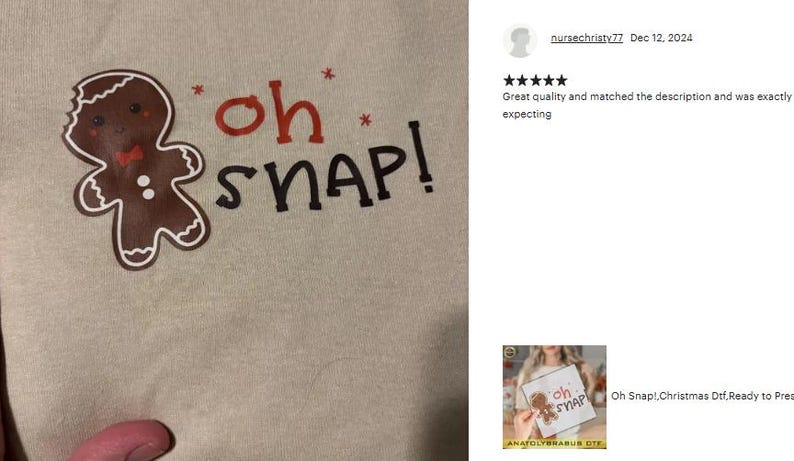 a person is holding a t - shirt with a picture of a ginger on it