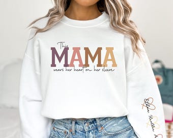 Custom This Mama Wears Her Heart On Her Sleeve Sweatshirt, Personalized Mom Shirt With Kids Names, Cute Mama Gift Outfit, Mothers Day Gifts