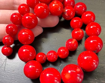 11-20mm Bamboo Coral Rounds, Bright Red, 15.75 inch strand.