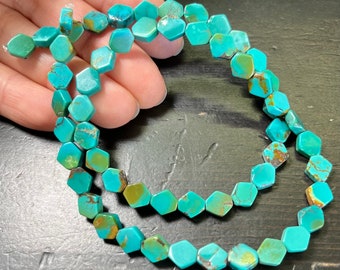 Two-tone Turquoise Hexagons. From Hubei, China. 15.75 inch strand.