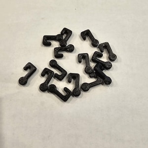 装飾用のゴルフ カート クリップ。ライトやバナーなどを吊るします。このパックには 20 個のクリップが含まれています。