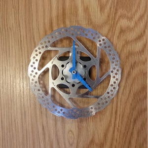 unpainted  mountain bike rotor wall clock