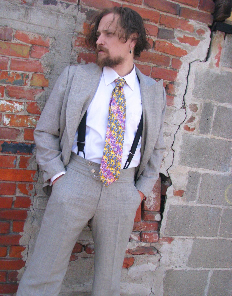 1940s Men’s Suit History and Styling Tips The Double-Breasted Houndstooth Sporting Suit $1,845.00 AT vintagedancer.com