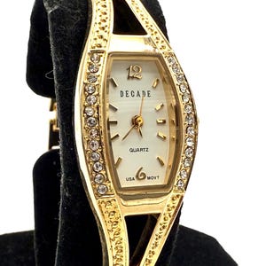 Vintage Crystal Bangle Watch: Gold Tone Ladies Decade Quartz  display picture 1