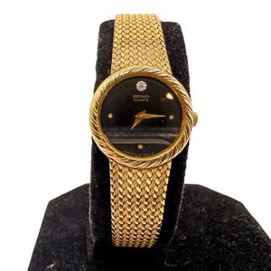 Seiko Vintage Gold Tone Quartz Watch With Black Dial And Mesh Bracelet Japan Model 2P20 Ladies Dress Timepiece