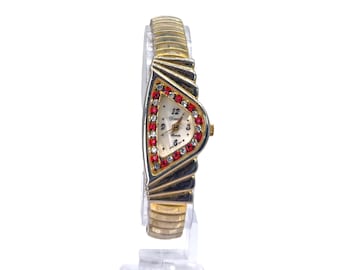 Reloj vintage Xanadu con diamantes de imitación: glamour asimétrico en tono dorado de los años 80