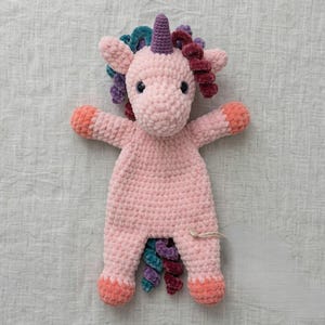 May include: A white ceramic mug with a black handle and the text "But First, Coffee" in a bold, black font. The mug is sitting on a wooden surface. The mug appears to be 12 ounces.