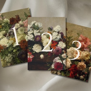 May include: Three vintage floral cards numbered 1, 2, and 3. Each card displays a different arrangement of flowers in red, white, and pink hues, set against a muted background, reminiscent of a classic painting.