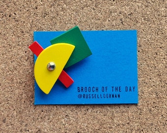 Colourful shapes brooch made from vintage Tap Tap set