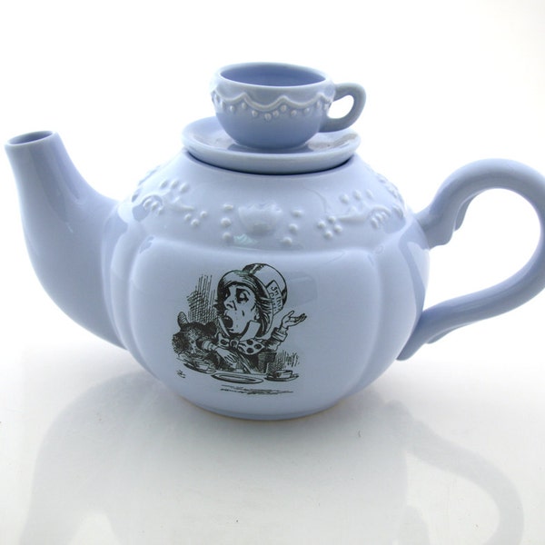 Alice in Wonderland Mad Hatter Teapot with teacup lid in soft blue
