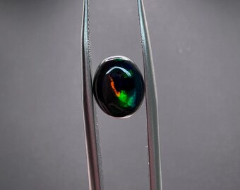 Natural Hand Mined Ethiopian Black Opal 1.16Ct. NO TREATMENT. Calibrated a jewelry Grade. Better In Person!!