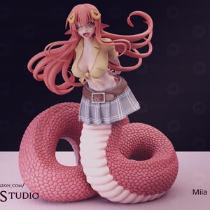 May include: A figurine of a character with long pink hair, a yellow collared shirt tied at the waist, and a grey plaid skirt. The lower body is a large, coiled pink snake tail with textured scales. The text Pink Studio and Miia are visible.