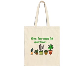 May include: A beige tote bag with the text "When I hear people talk about green..." printed in green. The bag features a line of five potted plants with green leaves and flowers.