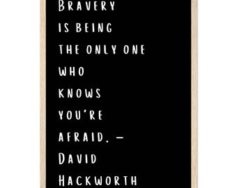 May include: Black framed chalkboard with white text that reads "Bravery is being the only one who knows you're afraid. - David Hackworth"