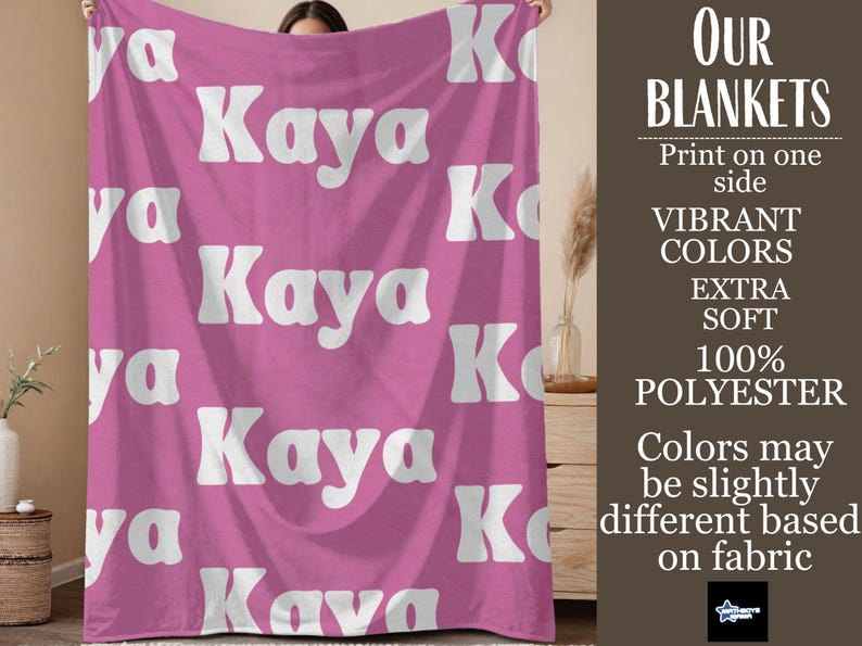 May include: A pink blanket with the name "Kaya" repeated in white, bold, retro-style font. The blanket is made of 100% polyester and is extra soft. The image also includes text that says "Our Blankets" and "Vibrant Colors."