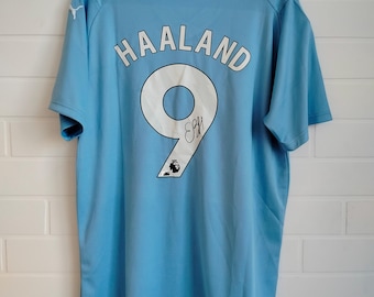 Maglia da casa del Manchester City FC 2023/24 firmata e autografata da Erling Haaland #9 con certificato di autenticità