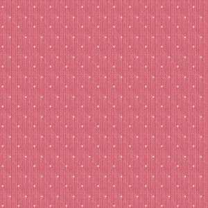 May include: A red fabric with a white polka dot pattern. The fabric has a subtle texture.