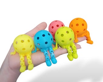 Il Pickleball Buddy™! Il compagno in miniatura del Pickleball Pal™! L'oggetto perfetto da esporre o da regalare agli appassionati di pickleball!