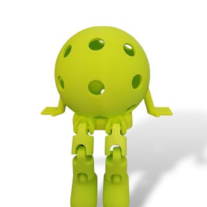 May include: A lime green, 3D-printed articulated ball figure with a spherical head featuring several circular holes. The figure has jointed legs and small, flat arms, giving it a playful, cartoonish appearance. The figure is set against a white background.