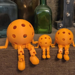 The Pickleball Pal™! The Original Articulated Pickleball Gift! The Perfect Display or Gift for Pickleball Fans! Orange