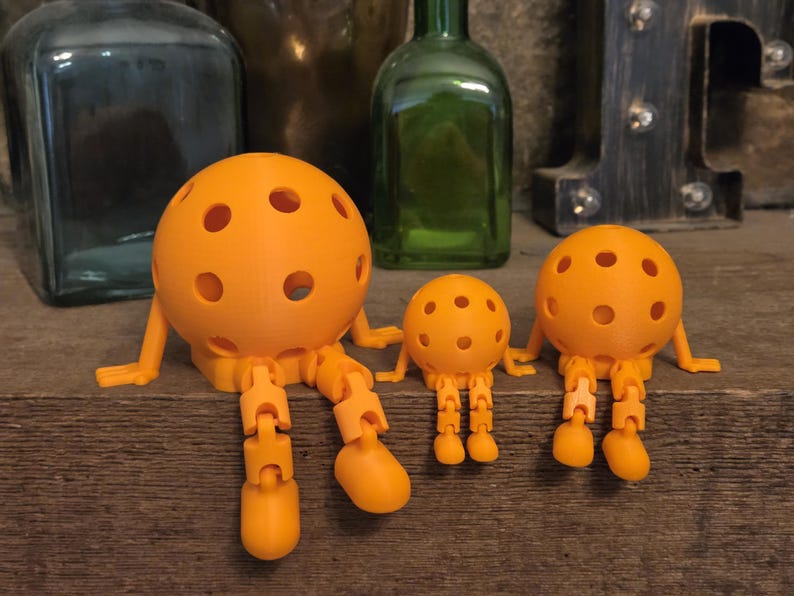The Pickleball Pal™! The Original Articulated Pickleball Gift! The Perfect Display or Gift for Pickleball Fans! Orange