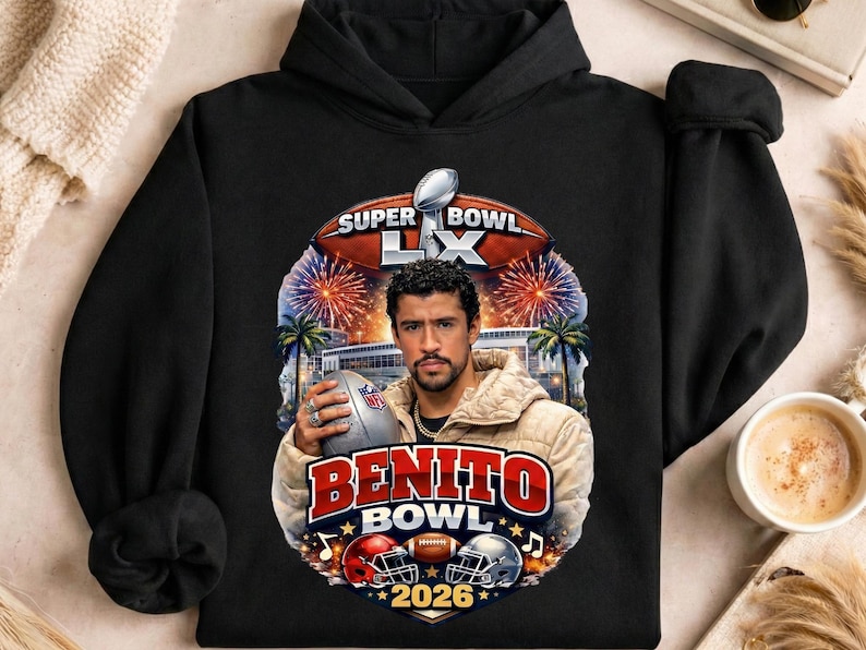 May include: Black hooded sweatshirt featuring a graphic of a man holding a football, with the text "Super Bowl LX" and "Benito Bowl 2026". The design includes fireworks, palm trees, and football helmets.