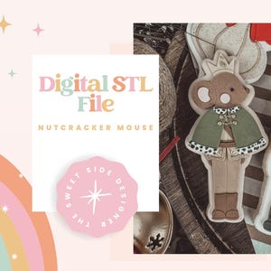 May include: Digital STL file for a Nutcracker Mouse design. The image features a cartoon mouse character wearing a green cape with a white and black spotted trim, a crown, and brown boots. The design is on a white background with a pink logo.