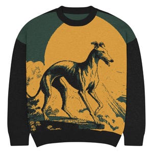 May include: Crew neck sweatshirt with a graphic of a greyhound dog in a landscape with a yellow sun. The sweatshirt has black sleeves and a black collar, with green accents on the shoulders.