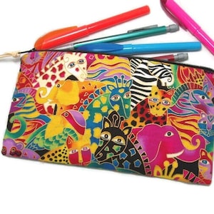 May include: A colorful zippered pencil case with a vibrant pattern of animals, including elephants, giraffes, zebras, and birds. The case is made of fabric and has a black zipper.