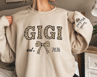 Custom Leopard Gigi Sweatshirt With Kid Name On Sleeve, Personalized Gigi Sweatshirt, Gift For Gigi, Christmas Gift Gigi Est 2025 Sweatshirt