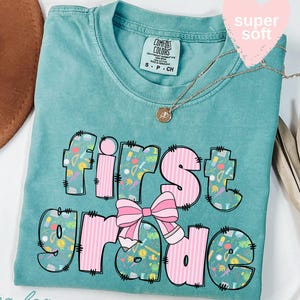 Comfort Colors® First Grade Teacher Shirt, Back to School 1st Grade Tee, Teacher Appreciation Gift, Cute Elementary School, Coquette Bow