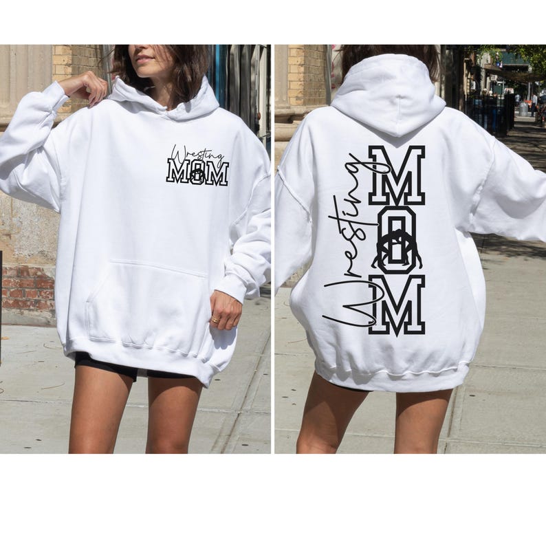 May include: White hooded sweatshirt with the text "Wrestling MOM" in black on the front and back. The text on the back is vertical with the "M" in large letters.