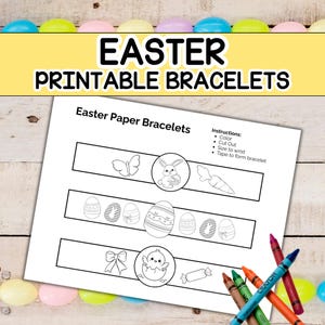 May include: A white paper with the text "Easter Printable Bracelets" and "Easter Paper Bracelets". The paper has three rows of bracelet designs with Easter-themed illustrations, including a butterfly, bunny, eggs, bow, chick, and candy. Crayons are scattered around the paper.