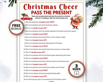 May include: A Christmas Cheer Pass the Present game card featuring a red car, Santa Claus, and twenty numbered prompts. The text includes instructions to pass gifts to people on the right or left. Two red circular badges indicate free bonus and 3 sizes.
