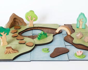 Alfombra de juego de madera para juegos de simulación de mundos pequeños, inspirada en los métodos Montessori y Waldorf.