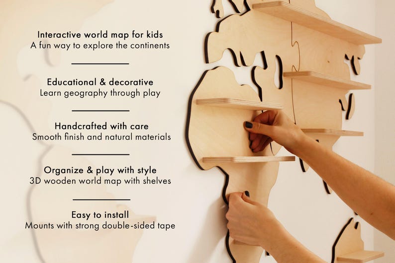 May include: A wooden world map with shelves, designed for children. The map is made of light-coloured wood and features a 3D design. Text on the left side reads: "Interactive world map for kids" and "Educational & decorative". Easy to install.