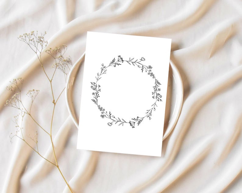 Puede incluir: Una ilustraci&oacute;n simple de una corona de flores en blanco y negro sobre un fondo blanco.