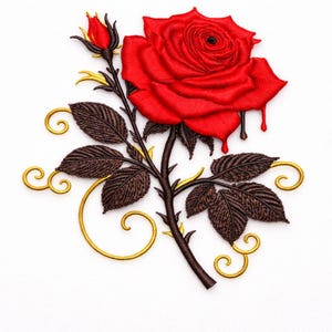 May include: Embroidered red rose with a detailed design. The rose has a large, open bloom with dark brown drips. The stem is dark brown with gold accents and thorns. The leaves are dark brown with gold swirls.