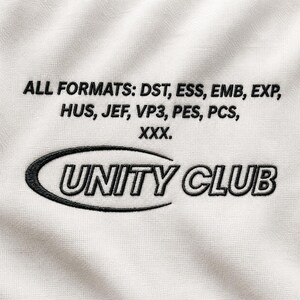 May include: A white fabric surface featuring black machine embroidery. The text reads: ALL FORMATS: DST, ESS, EMB, EXP, HUS, JEF, VP3, PES, PCS, XXX. Below this, the words UNITY CLUB are embroidered inside a black oval outline design.