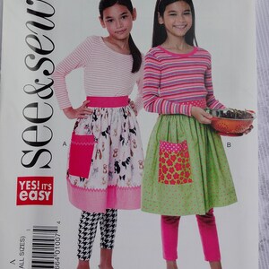 See & Sew B6611  Easy Sewing Pattern Girls&#39; Aprons with Contrast Pockets  Size M, L, XL  (7 - 16) UNCUT