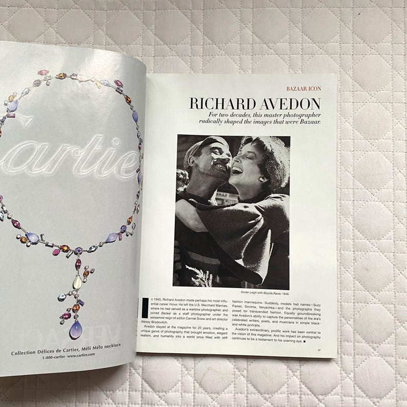 May include: A black and white photograph of a couple laughing. The man is wearing a dark shirt and the woman is wearing a white shirt. The text "BAZAAR ICON RICHARD AVEDON" is at the top of the image. The text "For two decades, this master photographer radically shaped the images that were Bazaar." is below the photograph.