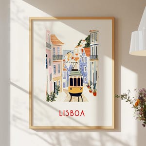 May include: A vintage-style illustration of a yellow tram traveling through a colorful, narrow street in Lisbon, Portugal. The buildings are painted in shades of pink, blue, and white, with tiled accents. The text "LISBOA" is printed in red at the bottom of the image.
