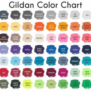 Puede incluir: Una carta de colores etiquetada como "Gildan Color Chart" muestra una variedad de colores de tela. La carta incluye tonos como negro, gris jaspeado, azul marino, rojo y verde, cada color se presenta en una muestra.