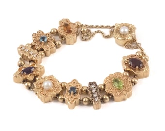 Pulseira vintage de ouro 14k com relógio deslizante e pedras preciosas