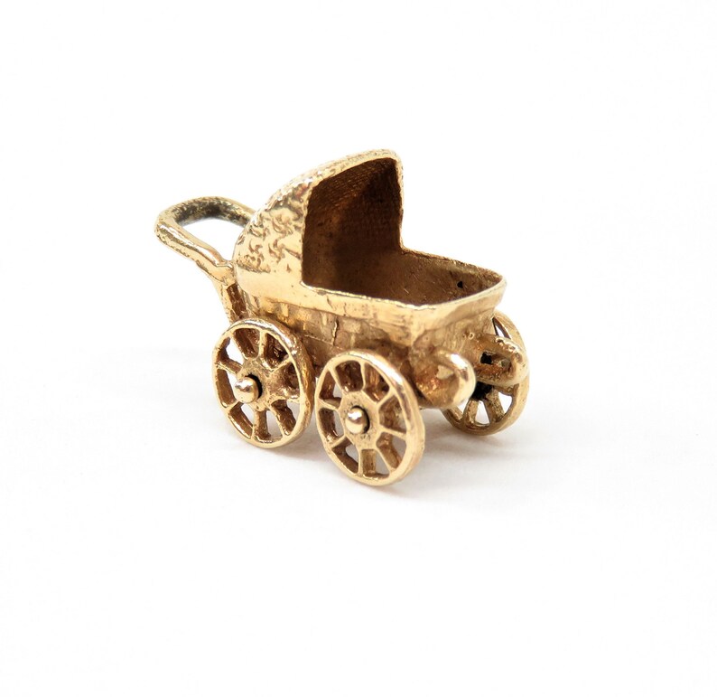 gold baby carriage