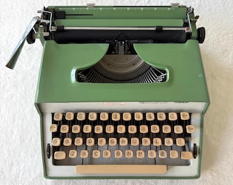 Groene typemachine Remington 2000 Sperry Rand Vintage, functioneel, klaar voor gebruik.